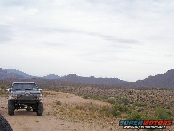 Dark SUV with off-road bumper and large tires, 1992 model year