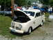 1948 Ford F1 - This vintage pickup truck, likely from the 1940s, is displayed with its hood open at an outdoor event.