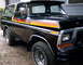 1979 Ford Bronco - This black Ford Bronco features a distinctive stripe decal package along its side.