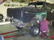 1978 Ford Bronco - Body of a 1978 Ford Bronco is being worked on in a garage setting.