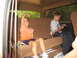 1995 Ford C-350 (Centurion Conversions) - Children ride in the back seat of a vehicle during a trip.