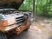 1995 Ford C-350 (Centurion Conversions) - Mud-covered Ford F-Series truck with hood open, a winch and air hose connected to the front bumper.