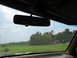 1995 Ford C-350 (Centurion Conversions) - View from inside a vehicle, showing a landscape with a truck in the distance.