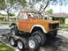 1977 Ford Bronco - This classic Ford Bronco is being transported on a trailer, showing signs of restoration or repair.