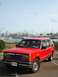 1992 Ford Explorer - 1992 Ford Explorer parked in front of a marina full of sailboats.