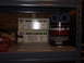 1979 Ford F-150 - Automotive repair supplies including POR-15 kits and Durabak-18 coating are stored on a shelf.