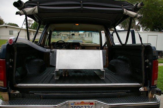 imgp3331.jpg Tank with plumbing visible, and filler neck...
2 Petcocks, 1 for the gravity feed to the main tank, 1 for the aux fuel hose, connected to a electric fuel pump, with the ability to hook up 10 feet of fuel line to fill other vehicles, motorcycles, etc.

I ran the gravity feed to the filler neck on the Bronco main tank, now when the main gets low, i flop the lever and refill with the Aux...

Both tanks have replaceable, clear filters located after the petcocks, leading into the fuel lines