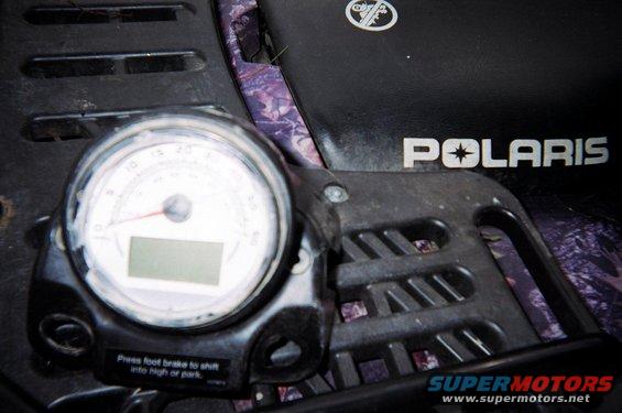 Polaris gauge cluster with digital display and analog speedometer