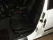 1993 BMW 3 Series - Close-up view of the interior of a car, focusing on the passenger seat and door jamb.