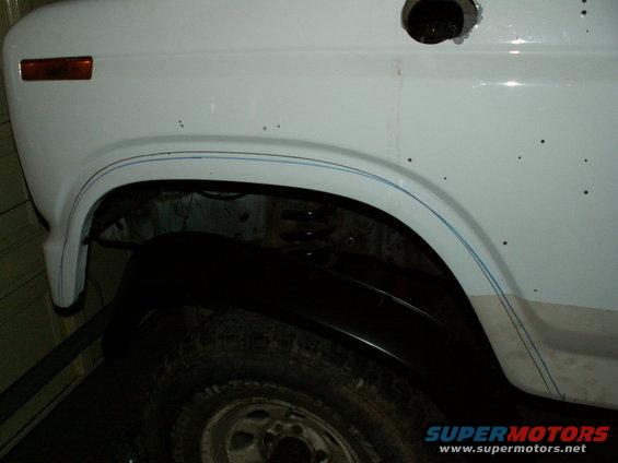 front left wheel arch marked ready to cut for cut-out flares
