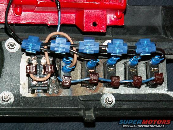 switches wired up...big 1 is for winch in and out (via relays) and fed power from winch power isolation switch beside it...others are for spotlights
