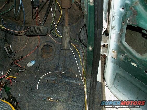 wiring for rear of truck (back-up lights, brake lights, taillights and RR turnsignal) will run under edge of carpet and down sill.....quick connectors inside base of b-pillar then route wiring inside trim to rear....no chassis wiring under truck anymore!!