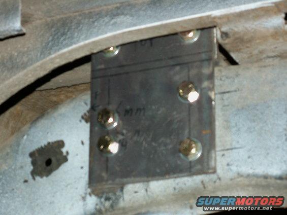 left side custom mounts...plate bolts thru chassis and top two bolts attach to right angle plate sitting on top of chassis...these top plates are grooved slightly to locate the cross tube and for welding ease