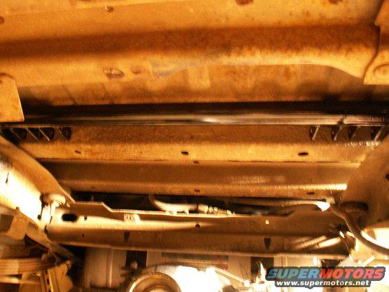 the custom quad shock mount (top) in place....you can see the mounts for each shock....these were cut and shaped from 5mm rectangular stock....cut in half length ways then docked to length b4 shaping...made matching ones to weld to diff as well.