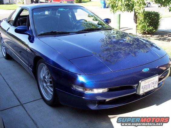 Blue 1995 Ford Probe parked on a driveway