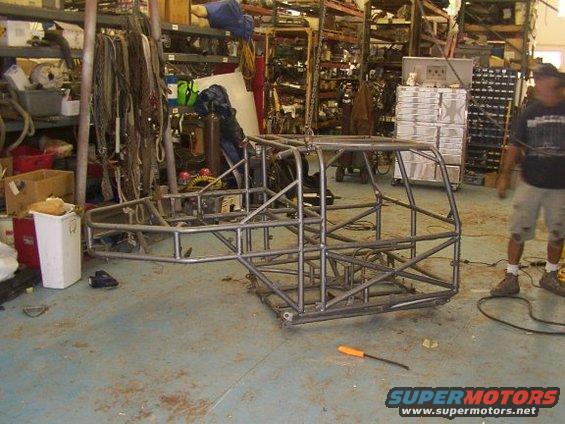 Custom tube chassis in workshop, viewed from side