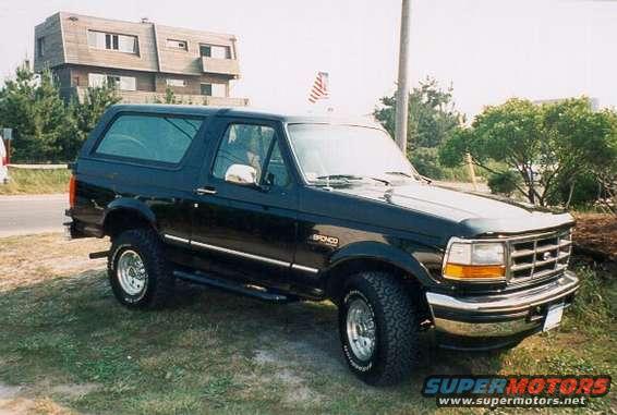 Black 1996 Ford Bronco parked on grass