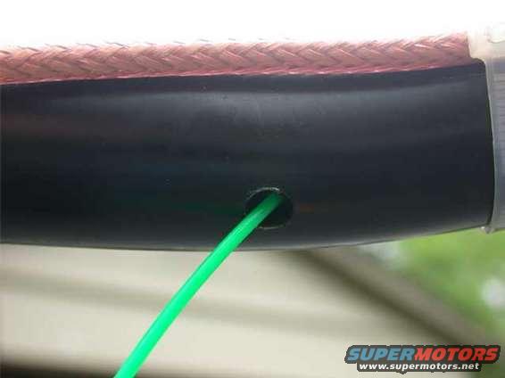 ant_06.jpg And here is the bottom hole, after pulling the "snake" through. I used a Snap On, hook tool to jimmy that line out the hole. It was a bit tricky. Patience....