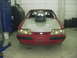 1990 Ford Mustang - Front view of a modified 1990 Ford Mustang with a prominent hood scoop.
