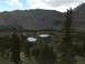 1978 Ford Bronco - A scenic view of a mountain valley with two reflective lakes among evergreen trees.