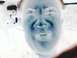2001 Ford Crown Victoria - This is an inverted photo of a person's face, with a website logo visible.