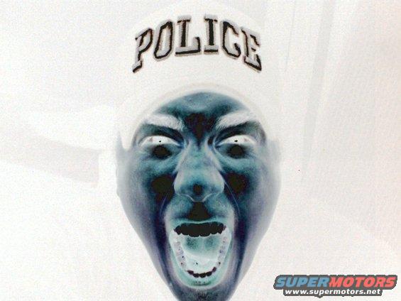 Inverted image of a person's face with mouth open, wearing a hat with the word POLICE on it