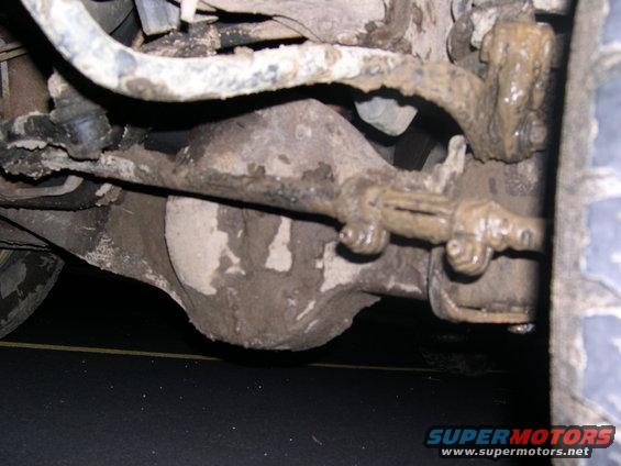 You can't tell too much but this is my front differential caked and filled with mud and getting high centered and getting dragged out as I got pulled loose!