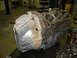 1993 Ford Taurus - Engine block and transmission housing assembly shown in a workshop setting.