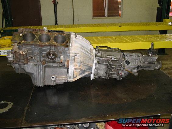 Engine block and transmission assembly on a workbench