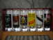 1997 Ford Crown Victoria - A set of six shot glasses displaying iconic artwork and logos from various rock bands.