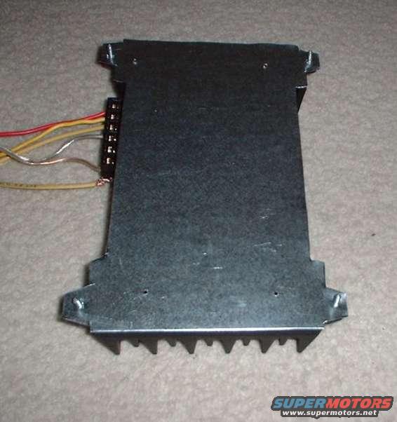 new_amp_with_plate.jpg new amp mounted to braket. note old amp mounting holes.