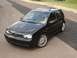2003 Volkswagen GTI - A black 2003 Volkswagen GTI is shown from a high-angle, three-quarter front view on a paved surface.
