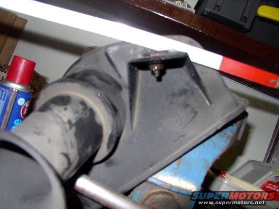 img_0019.jpg Sawing off the isolator mount tab is neither rocket science or difficult.