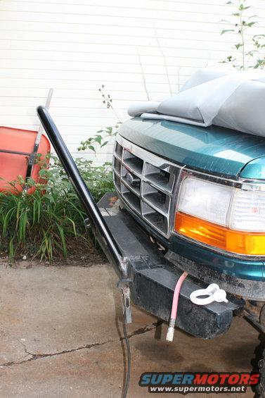 1992 Ford F-Series truck front end with aftermarket bumper and tow hook