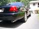 2003 Mercury Marauder - Rear view of a black 2003 Mercury Marauder parked on a driveway.