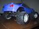 1990 Ford Bronco - This RC monster truck features a modified body and oversized tires, not a 1990 Ford Bronco.