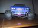 1990 Ford Bronco - This blue RC monster truck features a detailed front end with large, off-road tires.