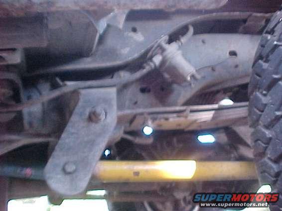 What is wrong with this picture??
That's a fuel pump OUTSIDE the frame.  