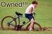 1978 Ford F-250 - A boy struggles to free his bicycle from a muddy field, with the word "Owned!!!" emblazoned above.