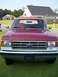 1988 Ford Bronco - This 1988 Ford Bronco presents a classic front-end view, its iconic grille and dual-tone paint scheme.