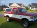 1988 Ford Bronco - This two-tone 1988 Ford Bronco is shown from the front three-quarter view on a sunny day.