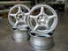 1994 Ford Probe - Set of four aluminum alloy wheels, likely aftermarket or OEM replacement parts.