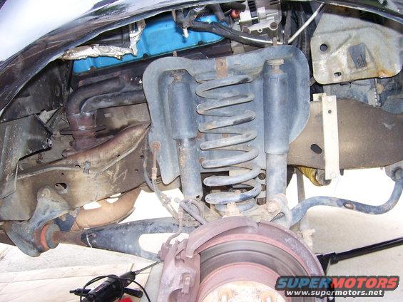 100_0278.jpg Ripped the splash gaurd down to get to passangerside cylinder head to install header