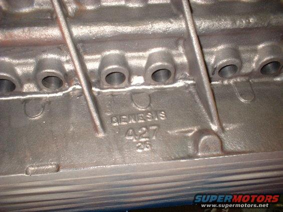 Engine block casting with "GENESIS 427" stamped on it