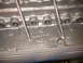1967 Ford Fairlane - Close-up of an engine block casting showing "GENESIS 427" and "26" stamped into the metal.