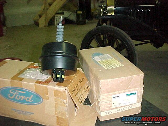 2005grillehl-motors.jpg NOS headlight motors right before installation into the restored grille assemblies. Not cheap.