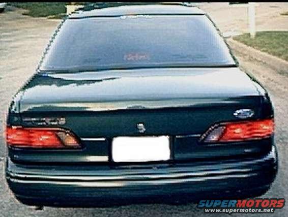1994 Ford Taurus rear view. Taillights and license plate area visible