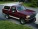 1992 Ford Bronco - This 1992 Ford Bronco is a two-tone maroon and white SUV with a removable hardtop.