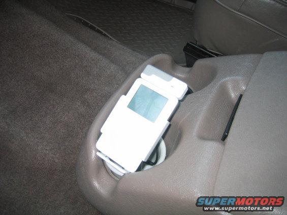 ipod.jpg Hardwired Ipod w/ cupholder and wireless remote