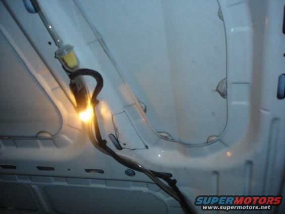 bronco-021.jpg Spacing the box up caused clearance issue between the MAF and hood. You can see the offending area. I cut the area out with a roto zip and cut of wheel.